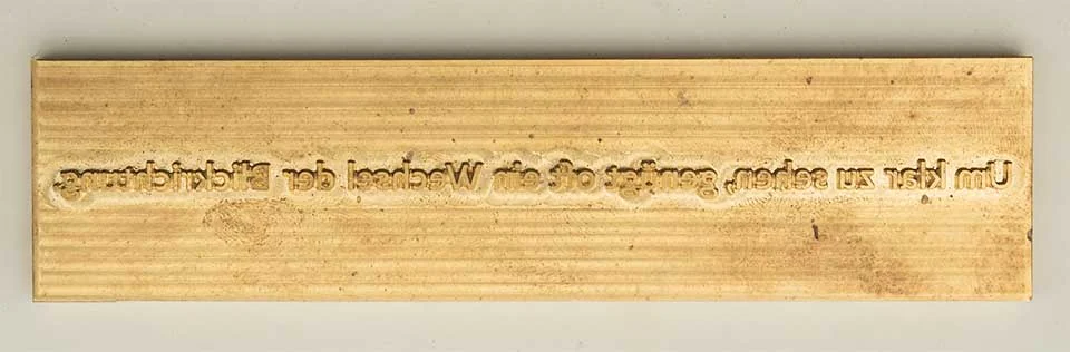 Sichtwerk Holzstempel mit Leitsatz